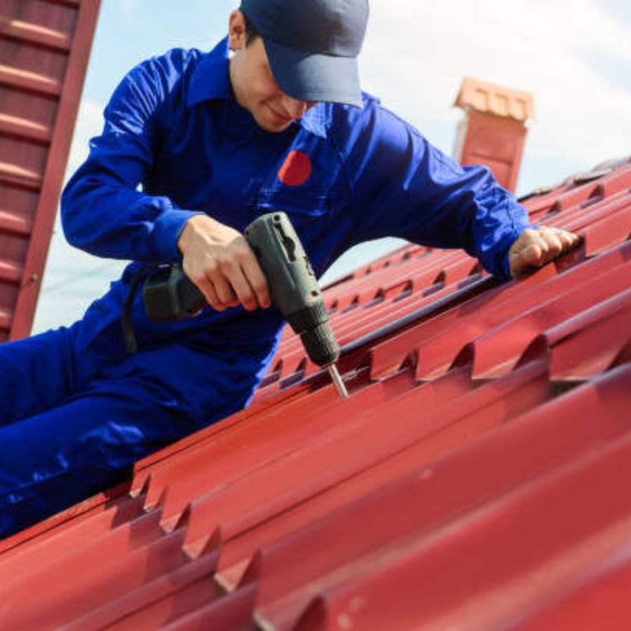 a man installing metal roofing