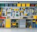 Interior of a well-organized shed showcasing clearly labeled active, passive, and seasonal storage zones with neatly arranged tools and storage solutions.