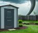 A 6x6 storm shelter integrated into a backyard shed, designed to withstand severe weather conditions, with threatening storm clouds in the background, illustrating its critical role in family safety during emergencies.