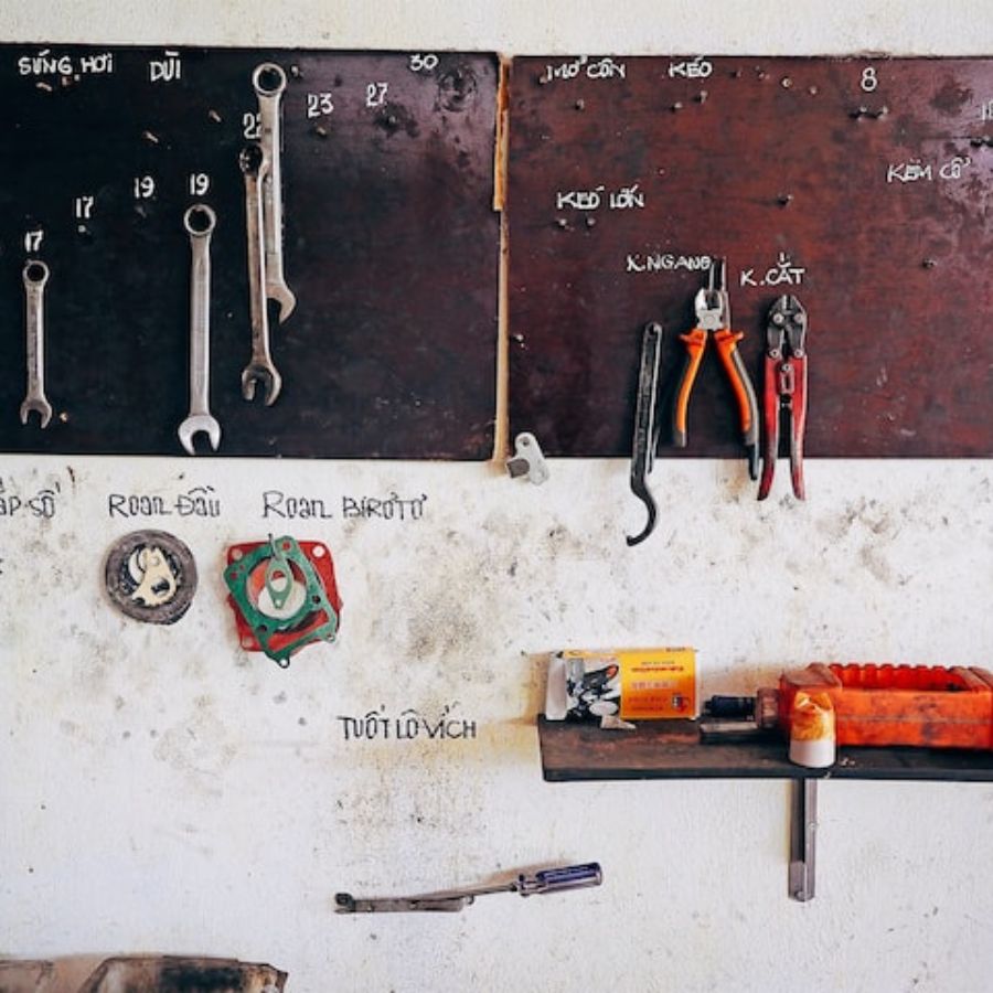 a marked wall for tools organization