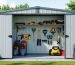 Open front view of a 3-sided equipment shed showcasing organized garden tools and security features like locks and lighting.