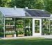 3D rendering of a hybrid greenhouse shed in a backyard setting, illustrating solar panels, dual-pane polycarbonate panels, vertical gardening systems, and organized storage solutions, positioned for optimal solar orientation.