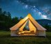 An eco-friendly camping site under a starry sky, featuring tents made from recycled materials and bamboo poles amidst a natural landscape, representing sustainable outdoor living.