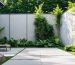 "Backyard with modern acoustic panels, integrated into lush greenery, demonstrating a tranquil outdoor space."