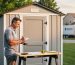 Homeowner standing beside a portable storage shed in a suburban backyard, reviewing a clipboard with a calculator on a workbench at golden hour, with a blurred fence, trees, and unbranded delivery trailer in the background.