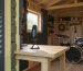 “Inside view of a soundproofed garden shed showing acoustic insulation, sealed wall seams, and a drum-and-recording setup in natural light.”