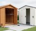 Backyard view showing a wood storage shed with visible structural framing and shelving hardware next to a smooth-panel resin shed under bright natural light.